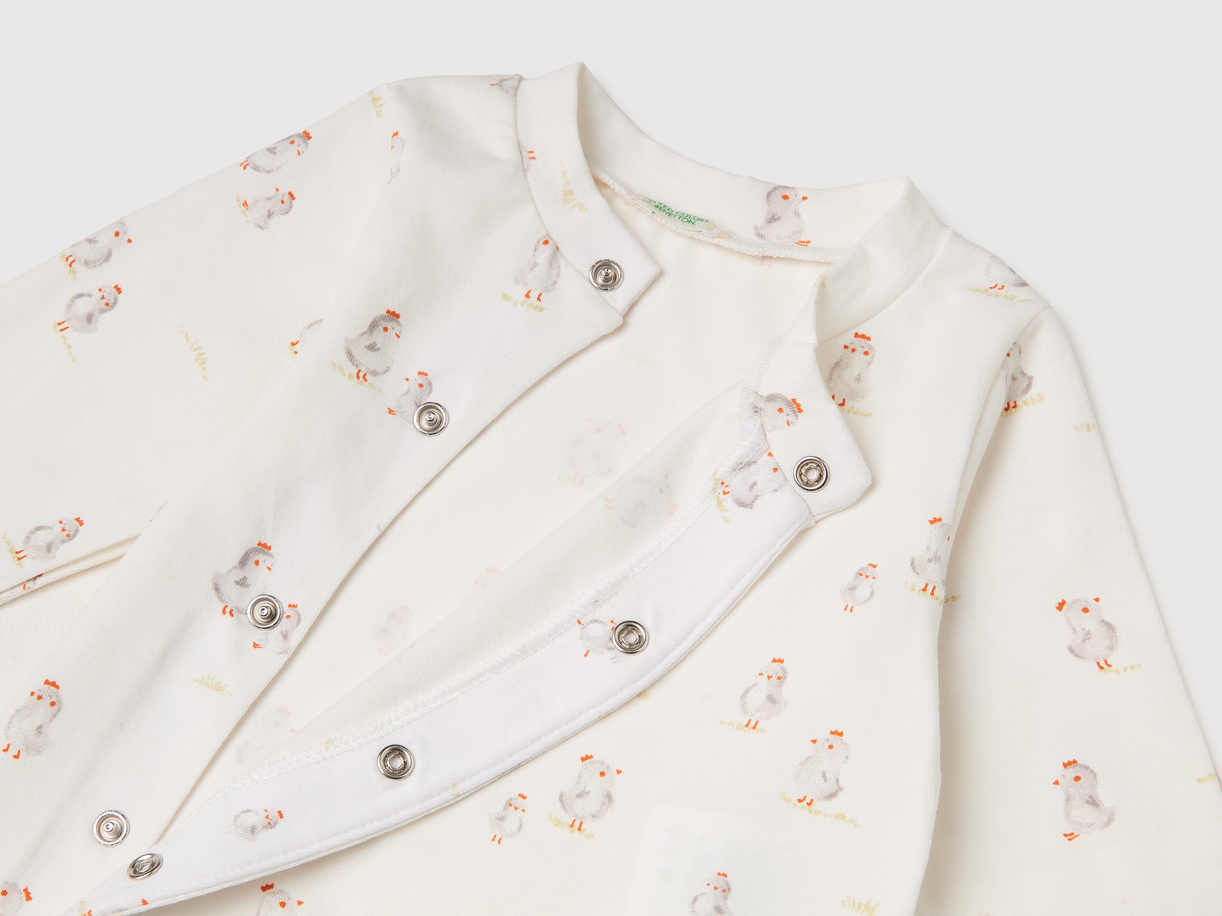Patterned onesie in stretch organic cotton - ucb_image_DS1