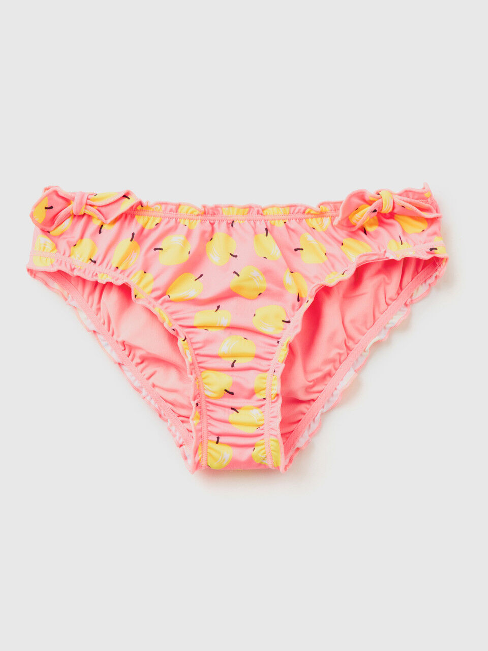 Slip de bain rose à motif pomme