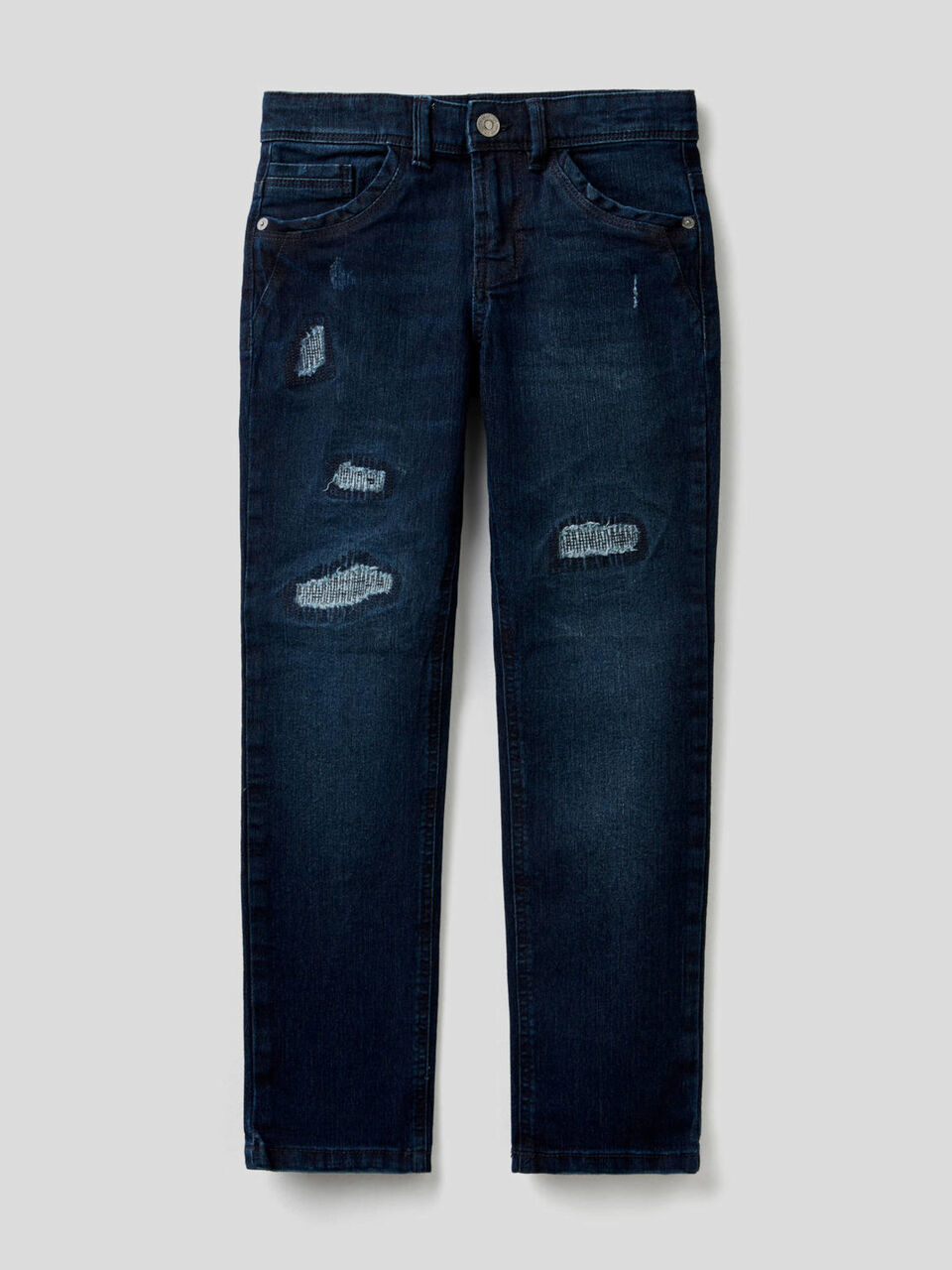 Jeans coupe slim avec aspect usé image number 1