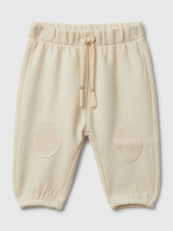Pantalon en coton avec patchs Naissancede