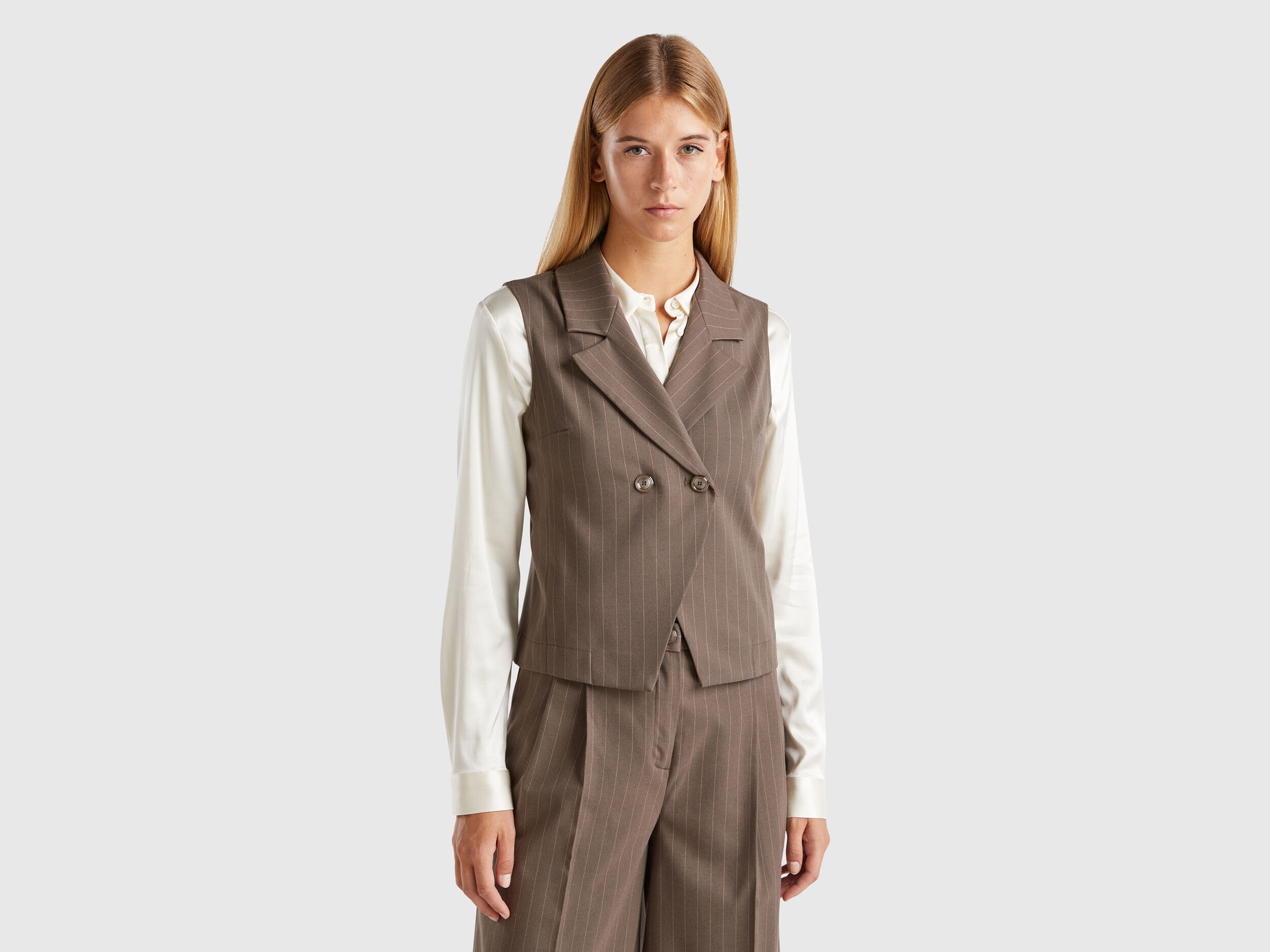 Gilet sans manche synonyme on sale