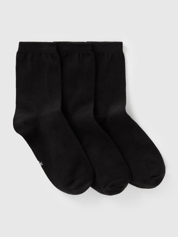 Trois paires de chaussettes longues en coton extensible