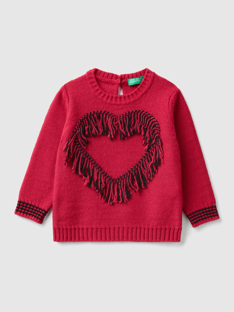 Pull avec coeur et franges image number 1