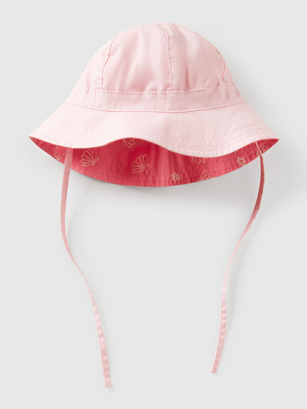 Bonnet réversible avec imprimé mer Naissancede