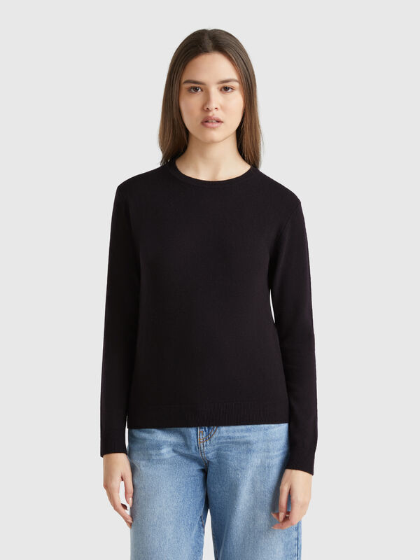 Pull noir à col rond en laine mérinos Femme