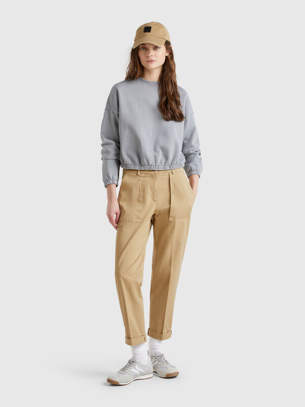 Pantalon à revers en coton stretch Femme