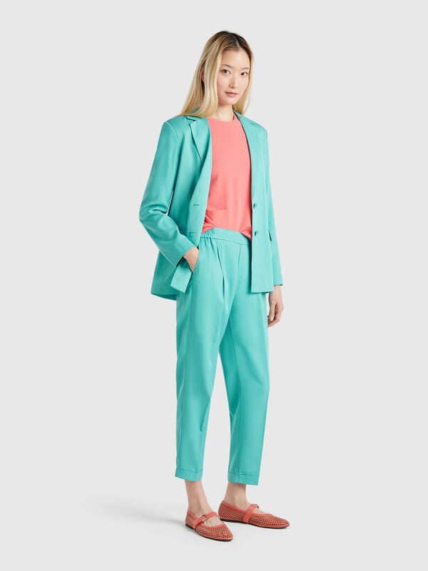 Pantalon fluide avec revers Femme