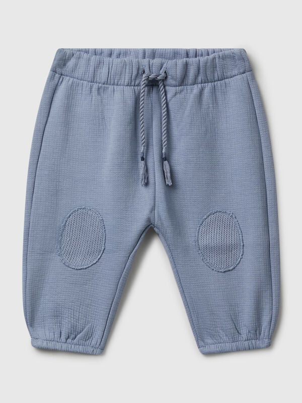 Pantalon en coton avec patchs Naissancede