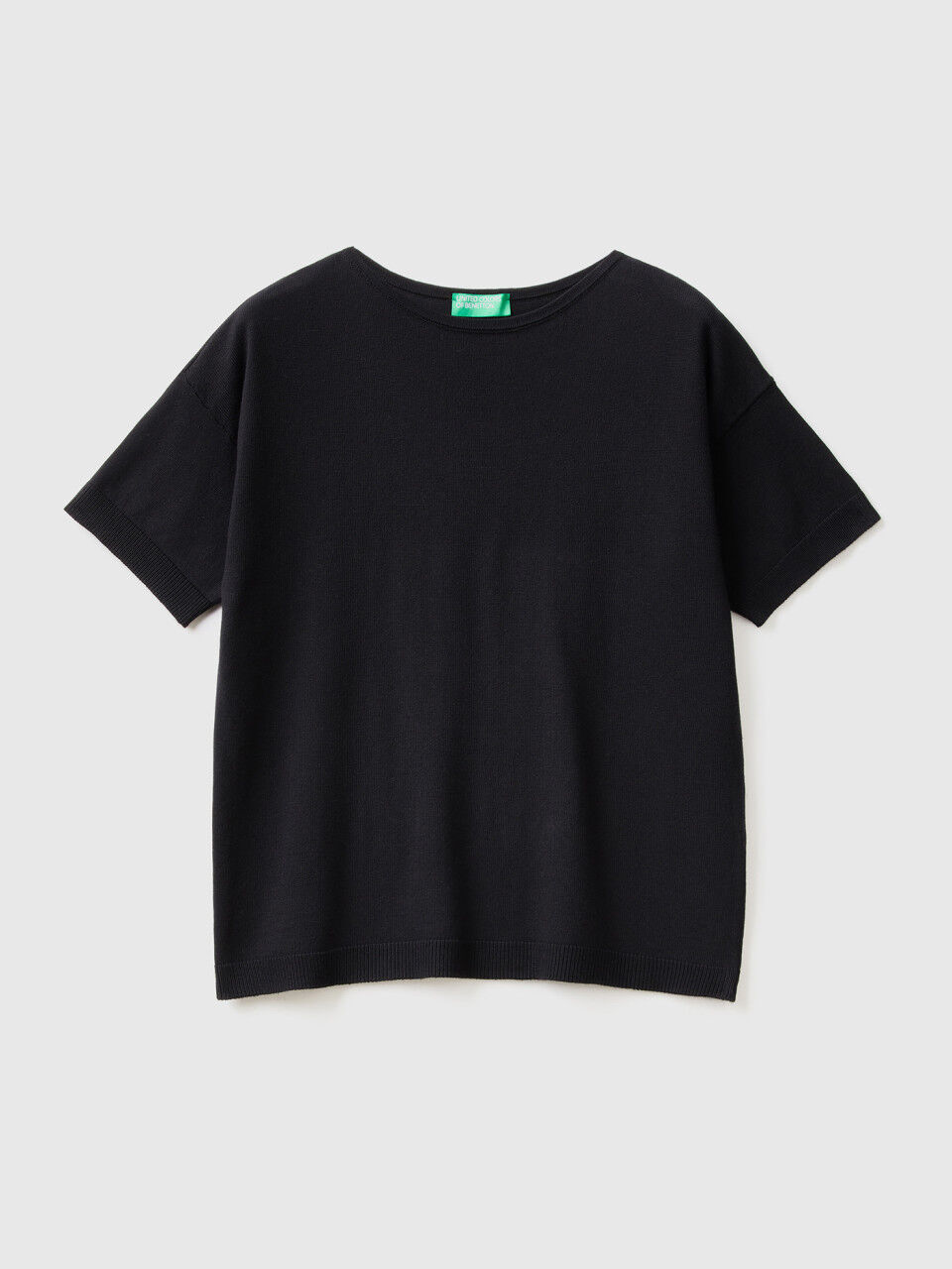 Pull noir hot sale manches courtes