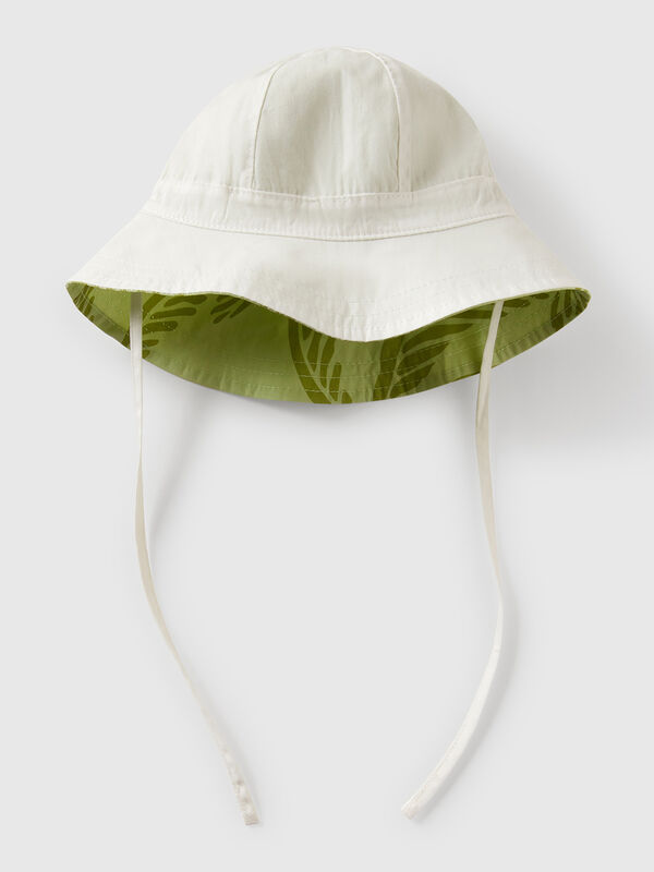 Bonnet réversible à imprimé tropical Naissancede