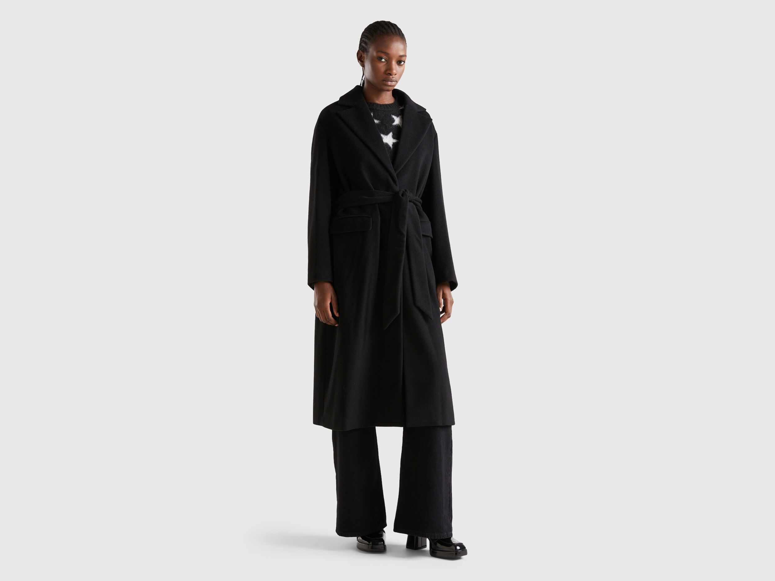 Manteau noir avec 2025 ceinture