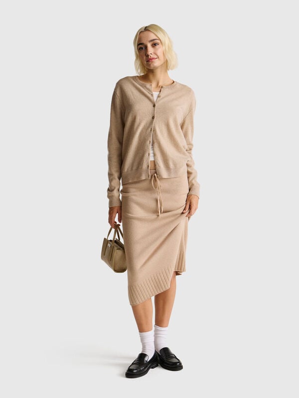 Cardigan beige à col rond en pure laine mérinos Femme