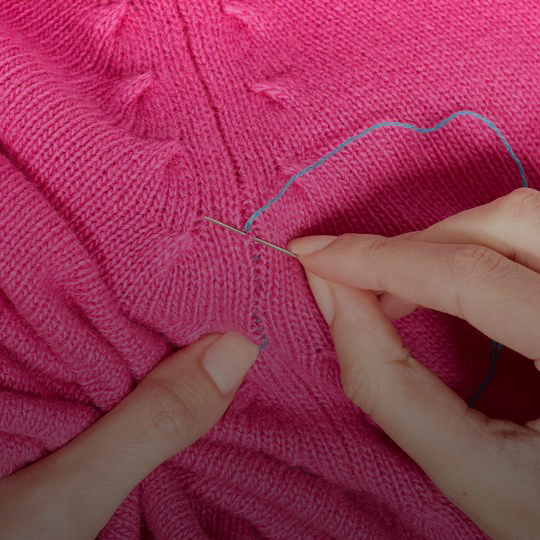 comment  réparer des vêtements décousus benetton